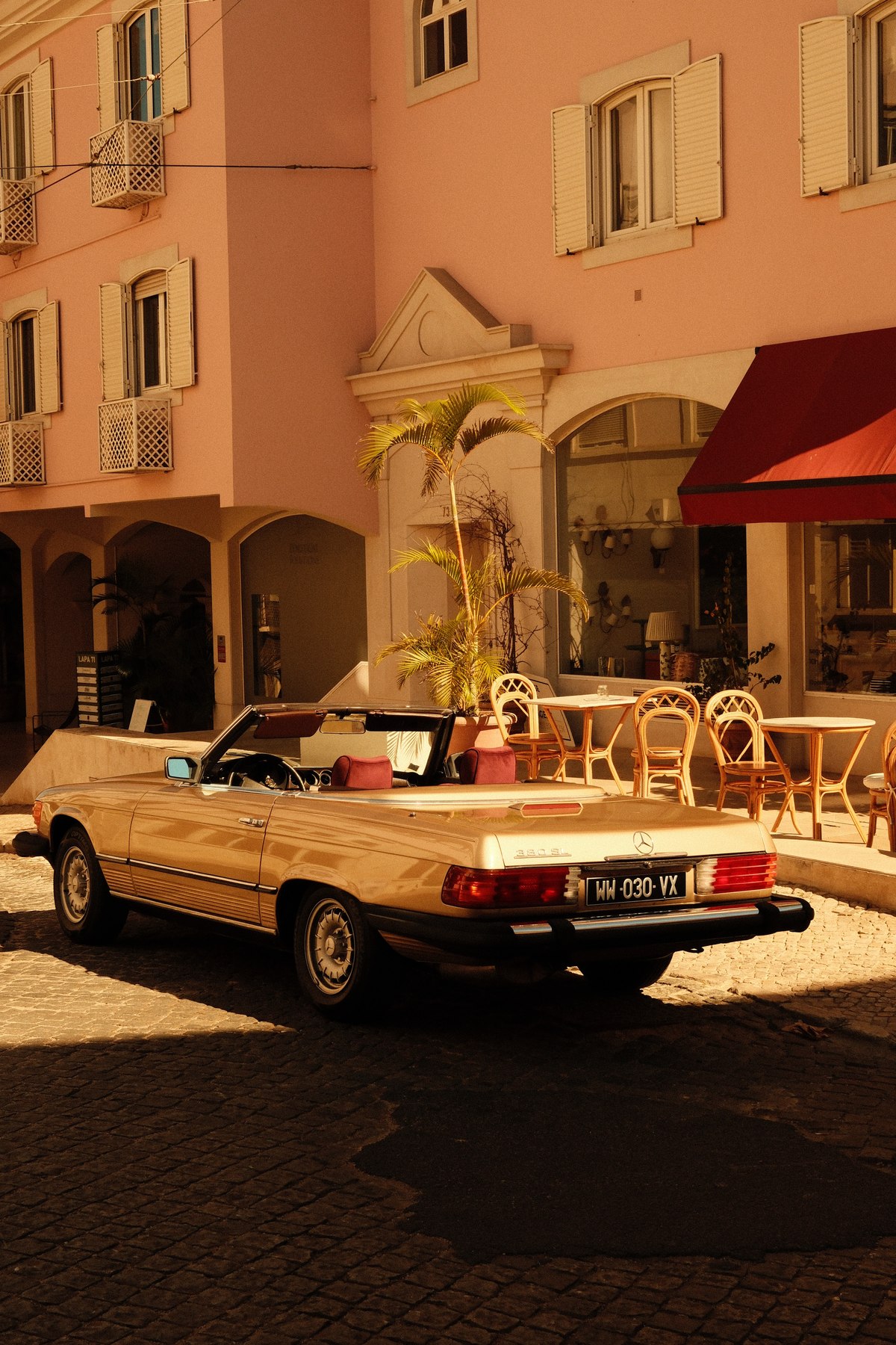 Classic Mercedes 380 SL rear view in Lisbon courtyard — available for film and photo productions